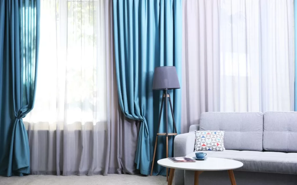 Floor-to-ceiling curtains enhancing the room's elegance