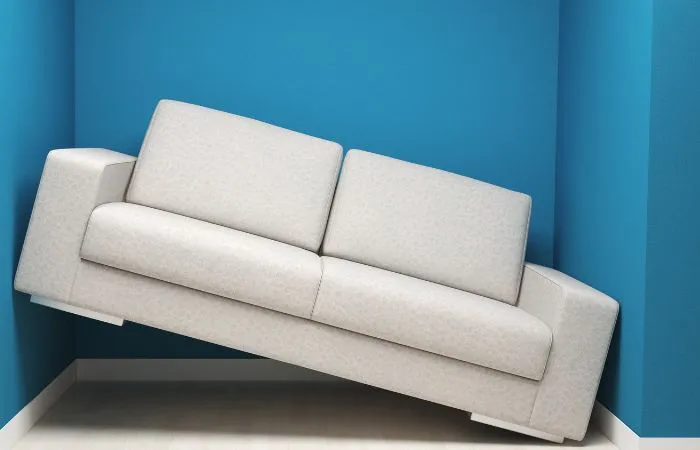 sofa squeezed in a small space! using furniture of the wrong size is a common interior design mistakes.