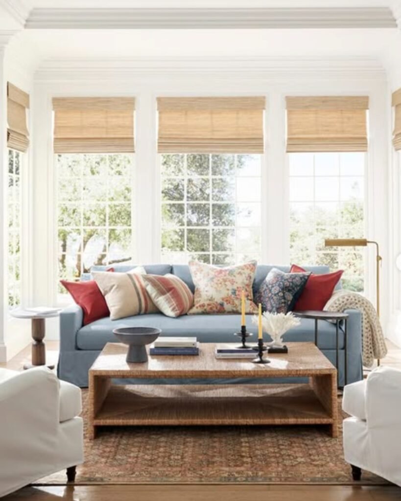 Budget friendly decor ideas—floating furniture layout with sofa and chairs pulled away from walls to open up living room space.
