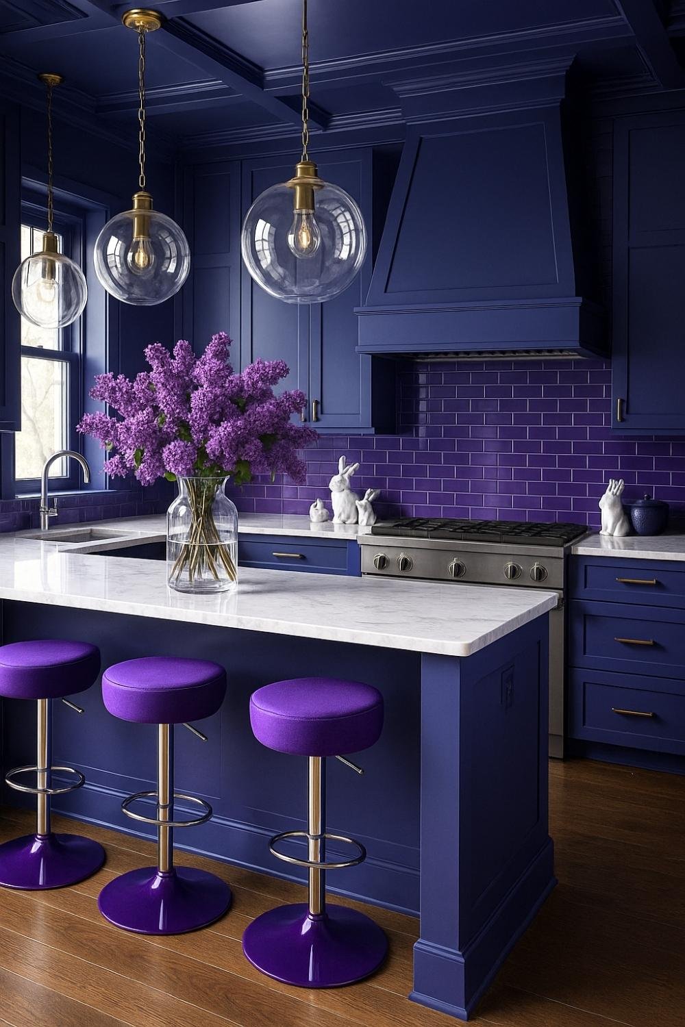 Bold plum kitchen with velvet stools and globe pendant lighting