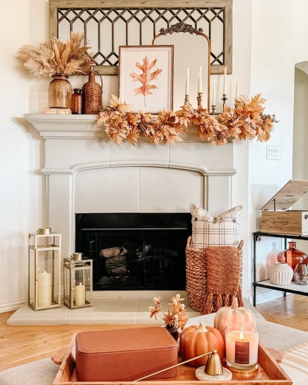 Minimalist fall mantel decorating ideas with neutral tones, soft pumpkins, and natural wood accents.
