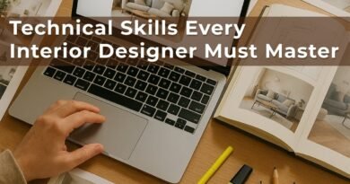 Interior designer’s workspace with laptop showing a 3D room model, open design book with floor plans, and tools for technical planning.