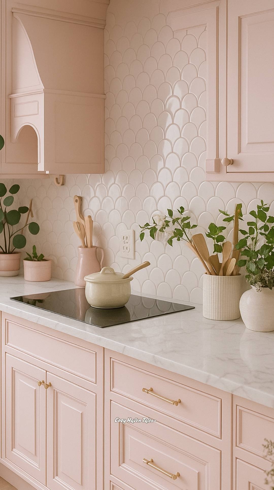 Blush Taupe kitchen with scallop tile backsplash, marble countertop, gold hardware, and potted plants for a soft, elegant look.