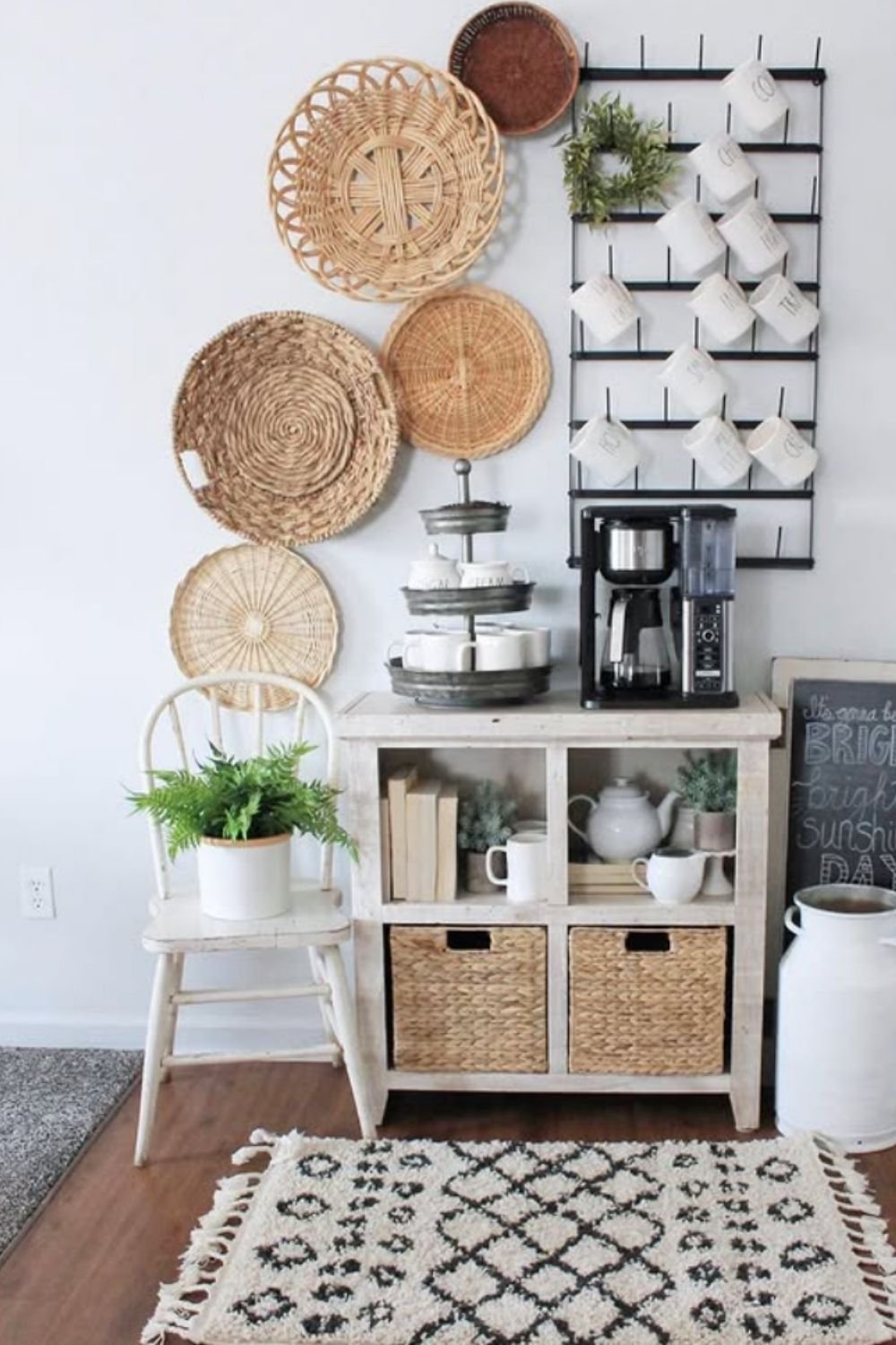 Functional boho wall with woven baskets hung above a storage unit.