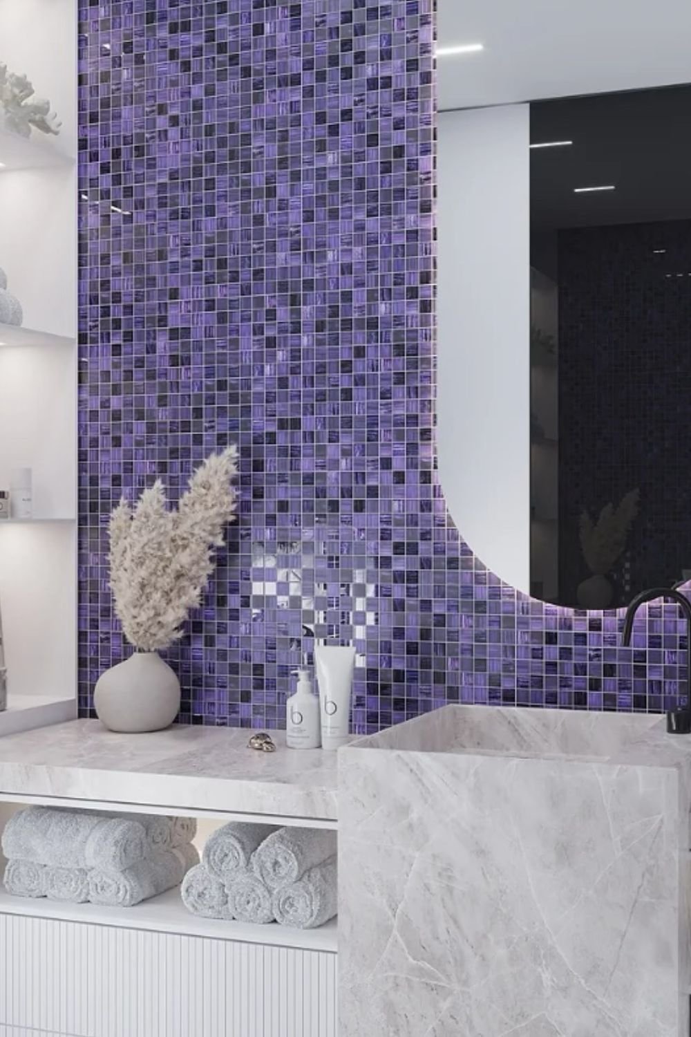 Luxurious bathroom with shimmering purple mosaic tiles paired with marble countertops and soft lighting, showcasing modern purple bathroom ideas.