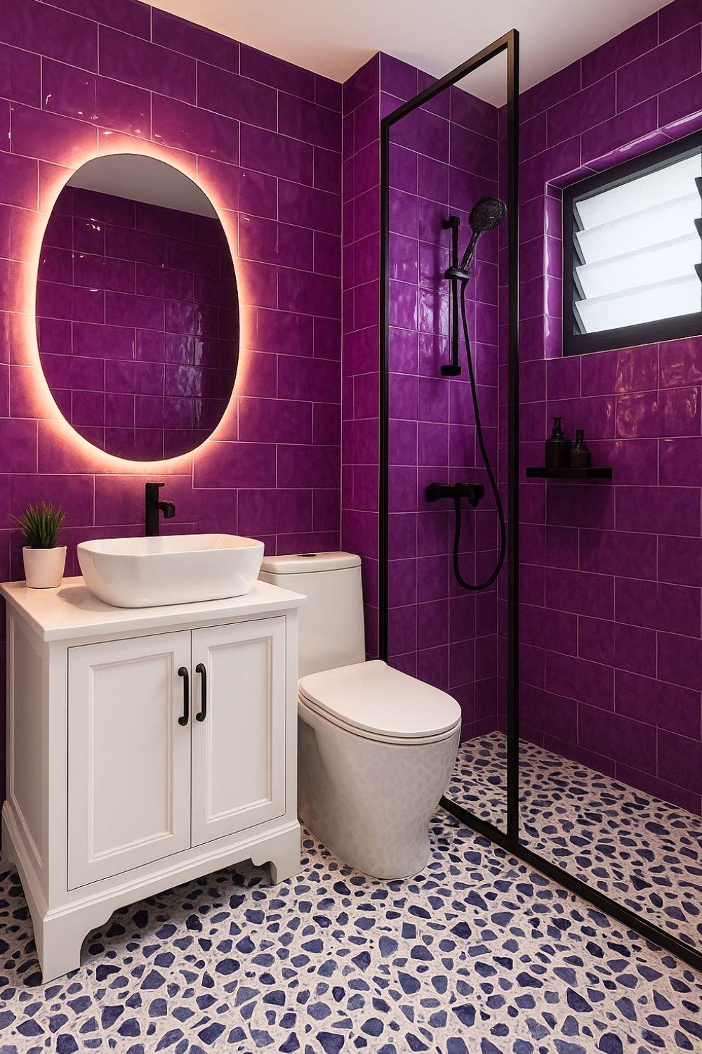 Modern bathroom with deep purple tiled walls, patterned floor, white vanity, and sleek black shower frame.