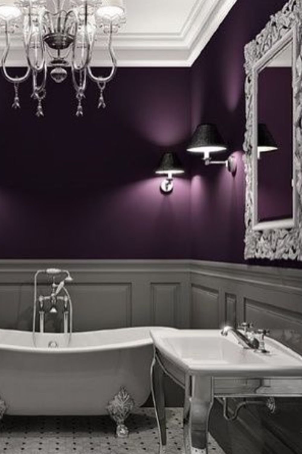 Elegant bathroom with deep plum walls, gray wainscoting, and a freestanding tub for a moody yet timeless look.
