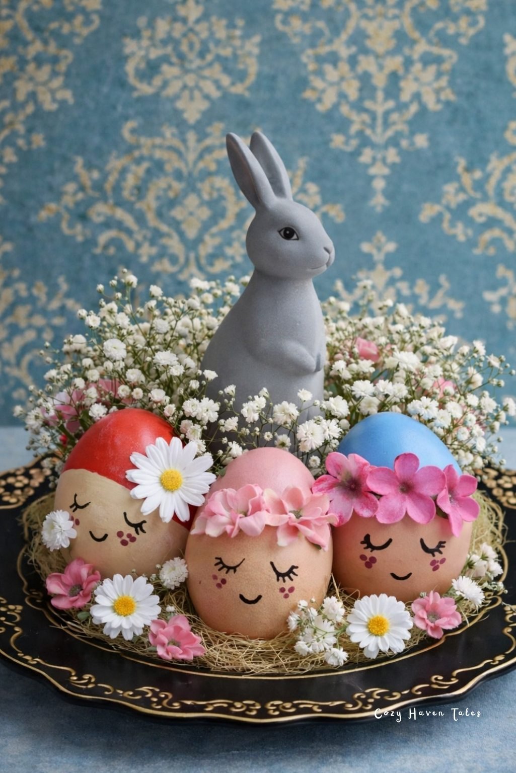 Decorative bunny figurine surrounded by painted eggs arranged as creative easter table decor.