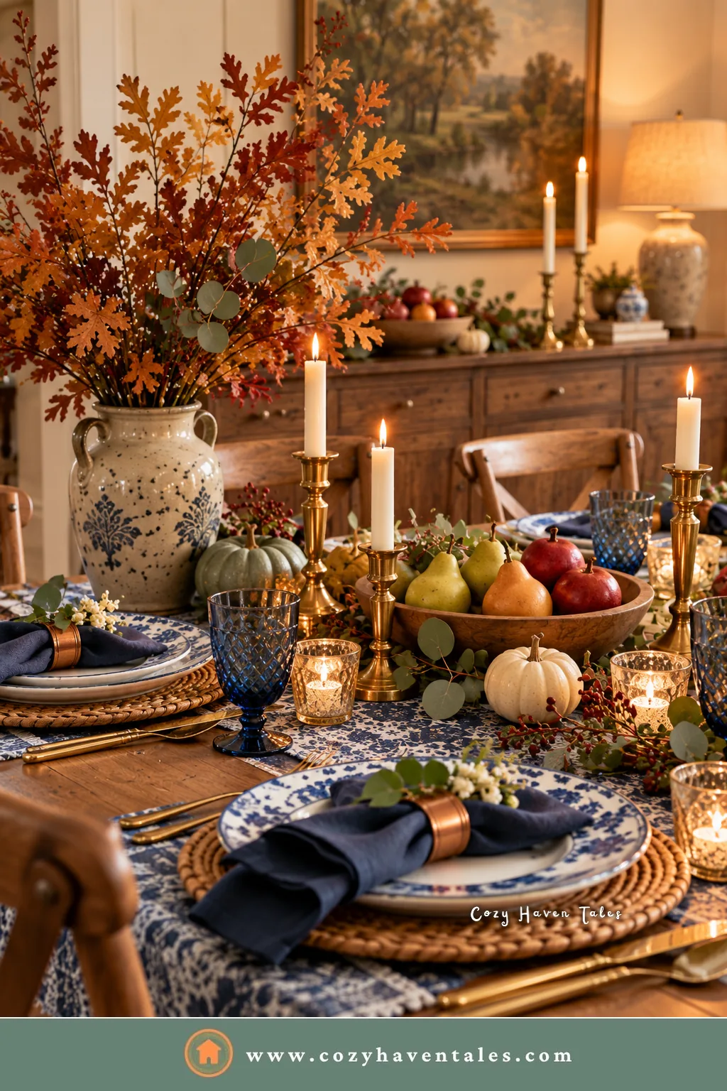 Thanksgiving centerpiece of pears, apples, and small pumpkins in a low bowl on a blue and white table, an easy way to decorate a Thanksgiving table
