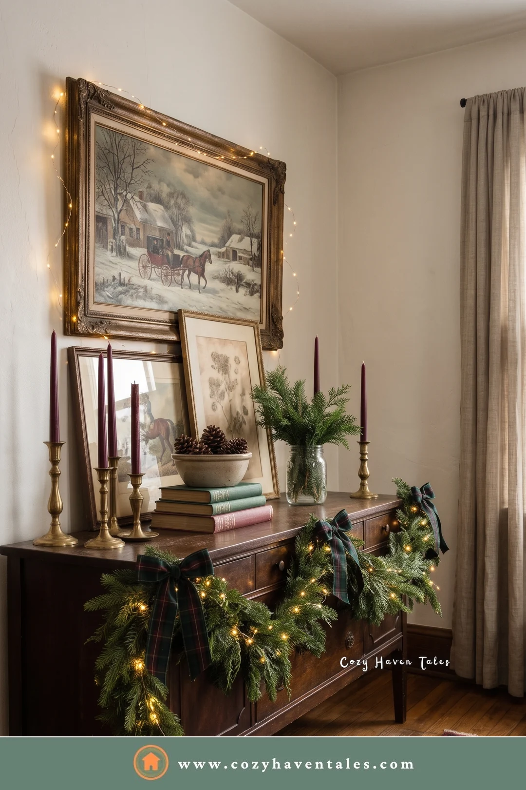Wooden dresser with burgundy taper candles, fresh garland, and framed art in a simple room